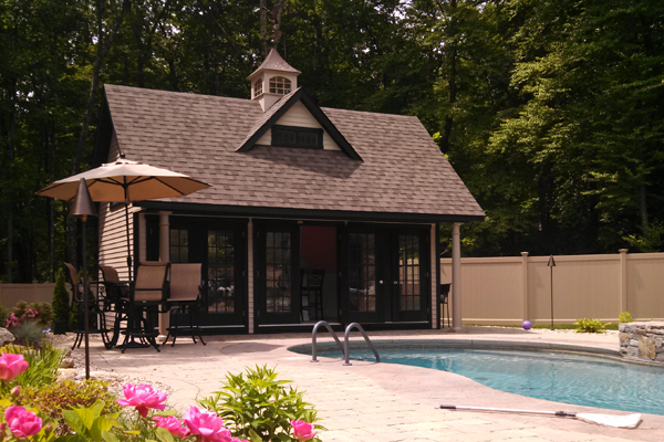 Pool house with rustic browns